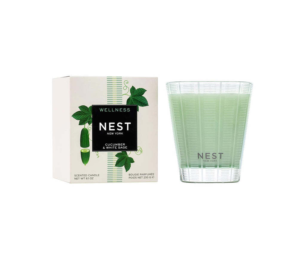 Nest Classic Candle in Cucumber White Sage scent housed in a white ceramic vessel with a natural wick.