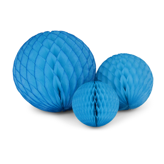 Three bright honeycomb paper balls in a trio set with geometric faceted silhouettes.