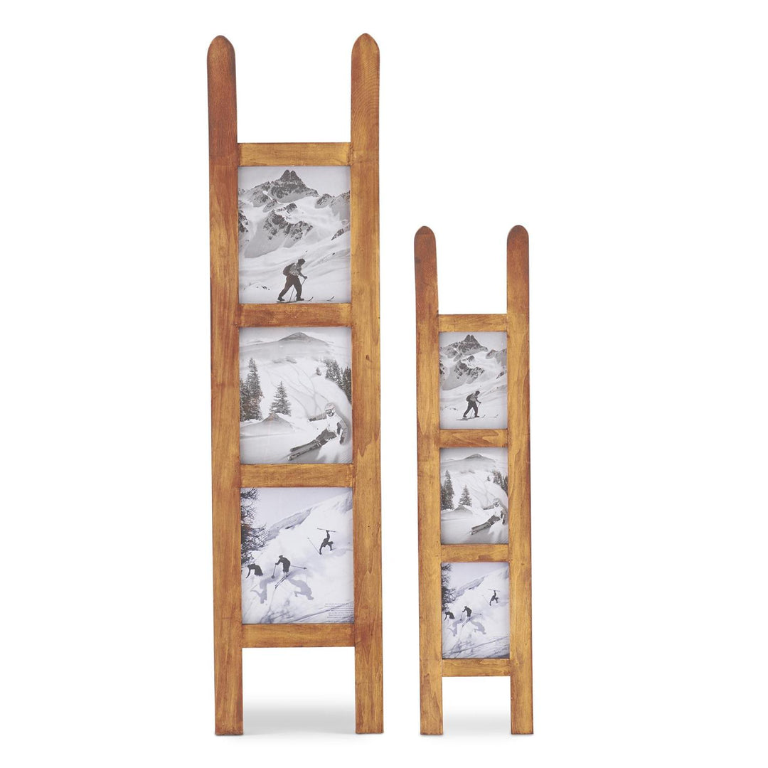 Two wooden sled-style wall hanging photo frames in small and large sizes with ski-themed pictures.
