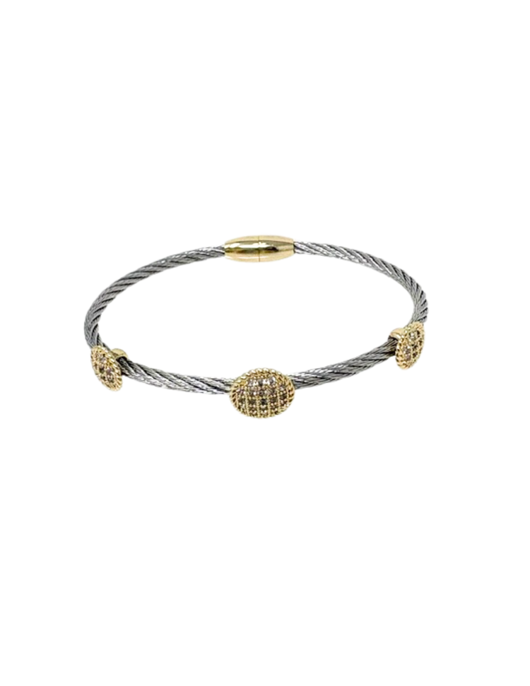 Two-tone silver rope bangle bracelet with three gold-tone circular cubic zirconia stations.