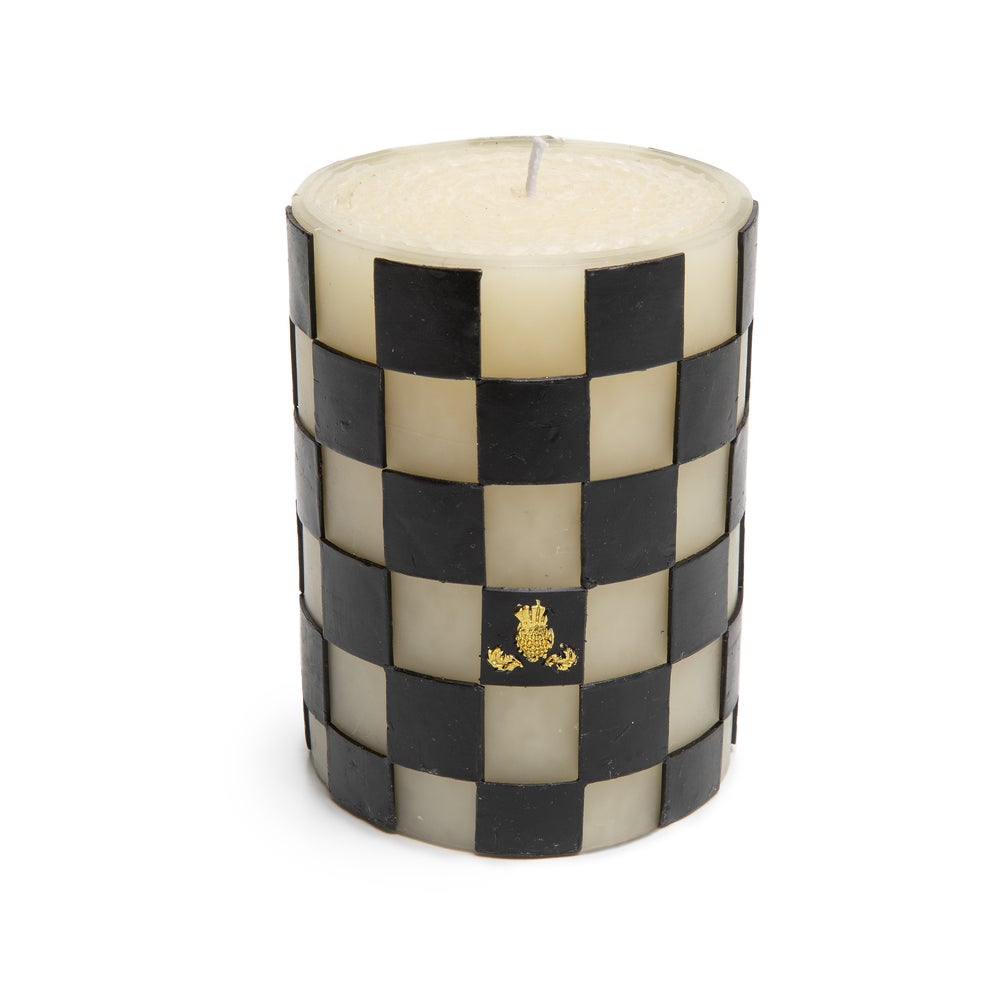 Check 4" Black Pillar Candle with a black and white checkered pattern and gold thistle emblem.