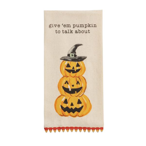 Halloween-themed flour sack towel with mini pom trim in orange fabric.