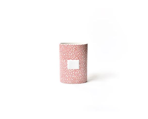 Small red ceramic oval vase with a subtle dot pattern.