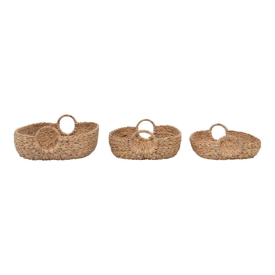 Hand-woven water hyacinth basket in natural beige with a cylindrical silhouette.
