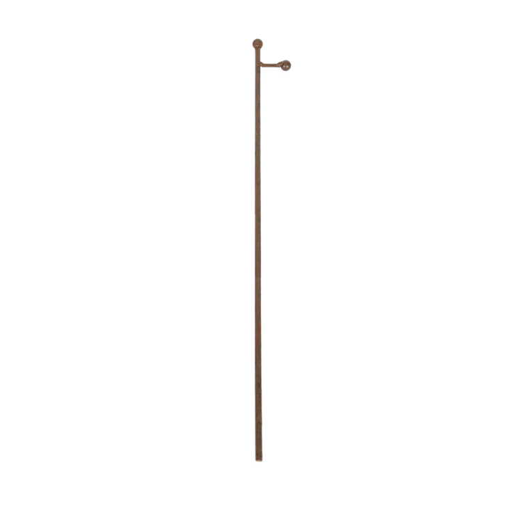 Slender rust-colored metal gallery display stake with a small horizontal arm and ball finials.