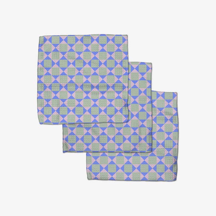 Set of three waffle weave dishcloths in recycled polyester with single-sided print and hang loops.