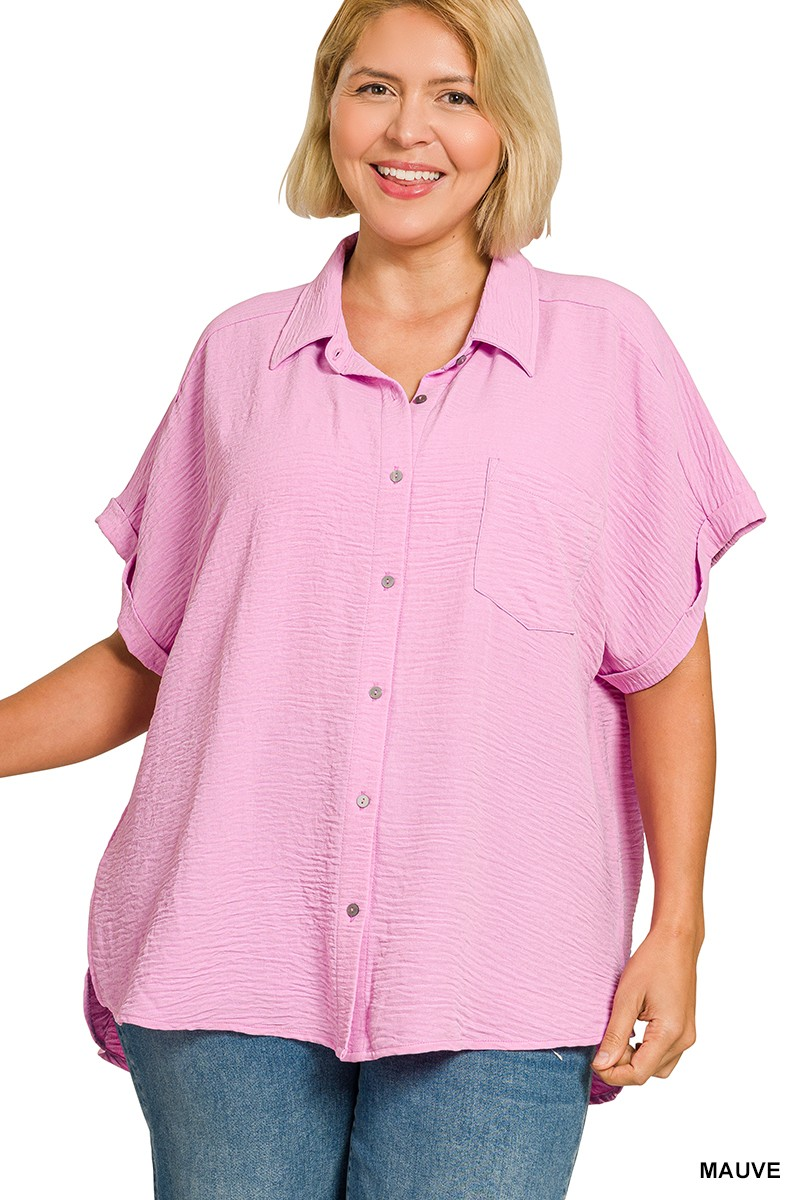 Plus size mauve pink woven airflow button-down shirt with short sleeves and a chest pocket.
