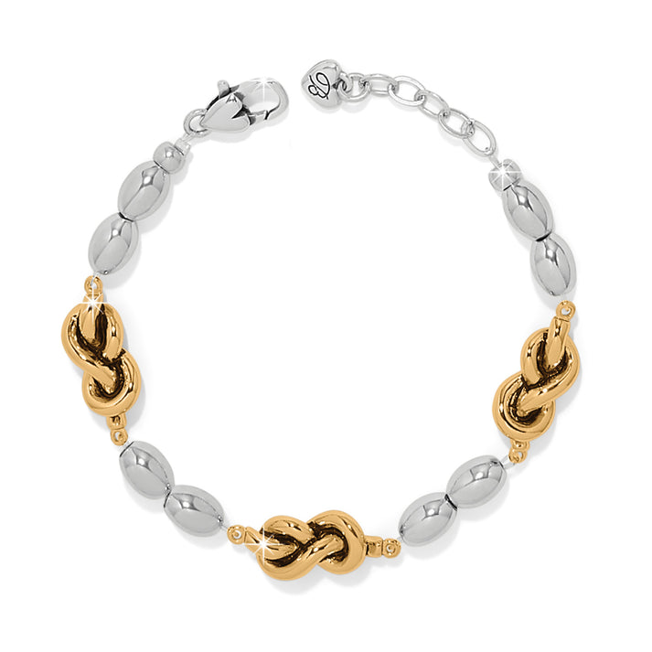 Two-tone adjustable Interlok single knot drop bracelet with lobster claw closure.
