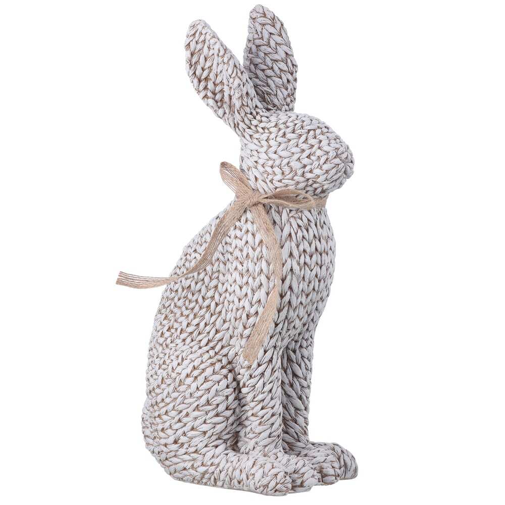 Woven resin rabbit figurine with a natural fiber texture in neutral tones.
