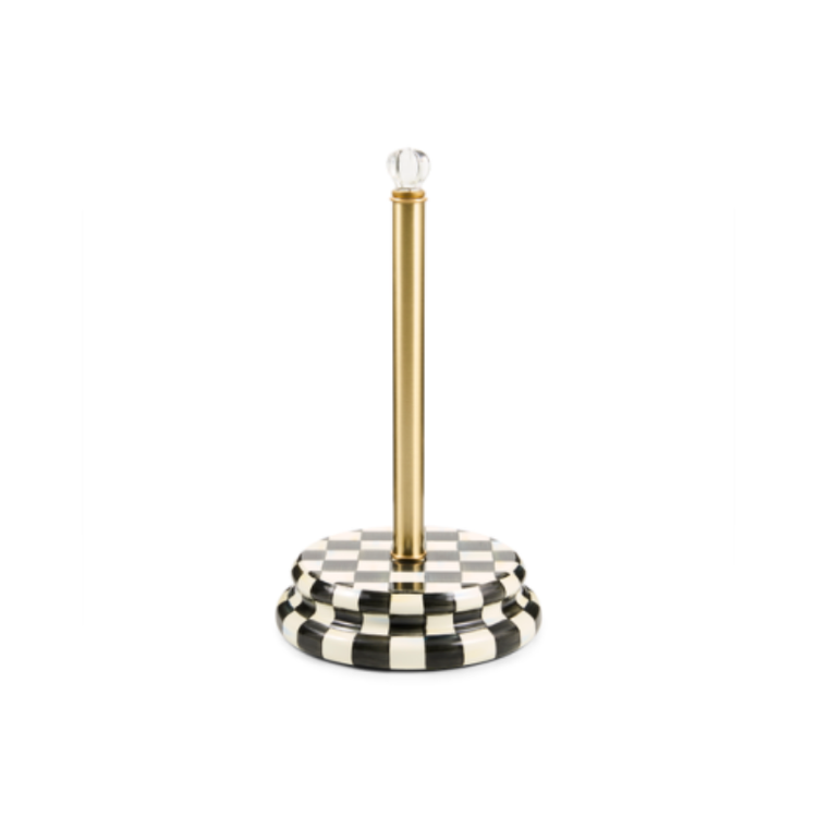 Check paper towel holder with a black and white checkered base, gold post, and glass knob.