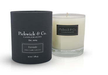 Pickwick Candle in a clear glass jar with a white wick.