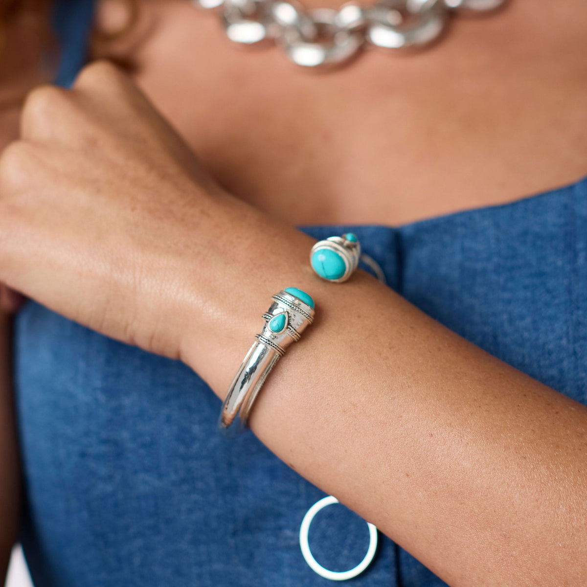 Silver Cannes Demi Cuff bracelet with a spring hinge closure.