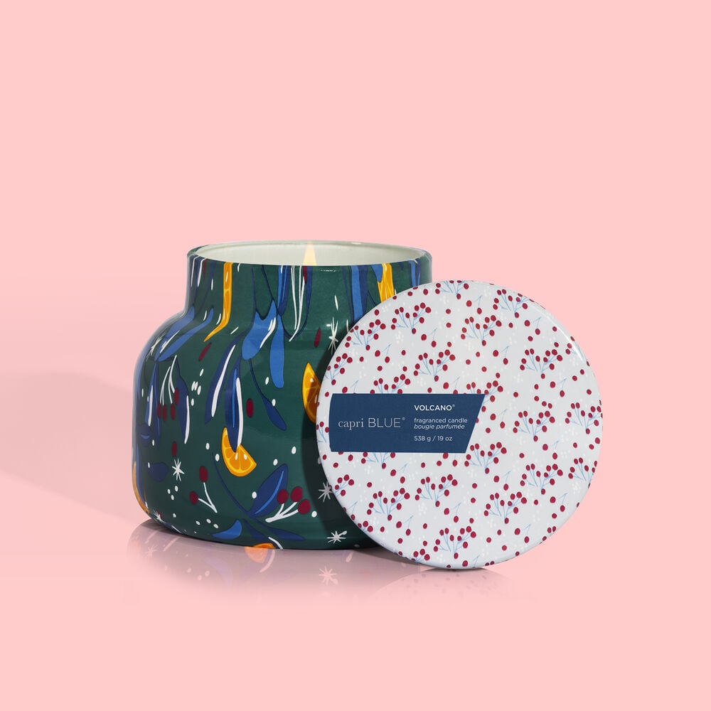 White ceramic play signature jar with Volcano Holiday pattern featuring red and green festive designs.