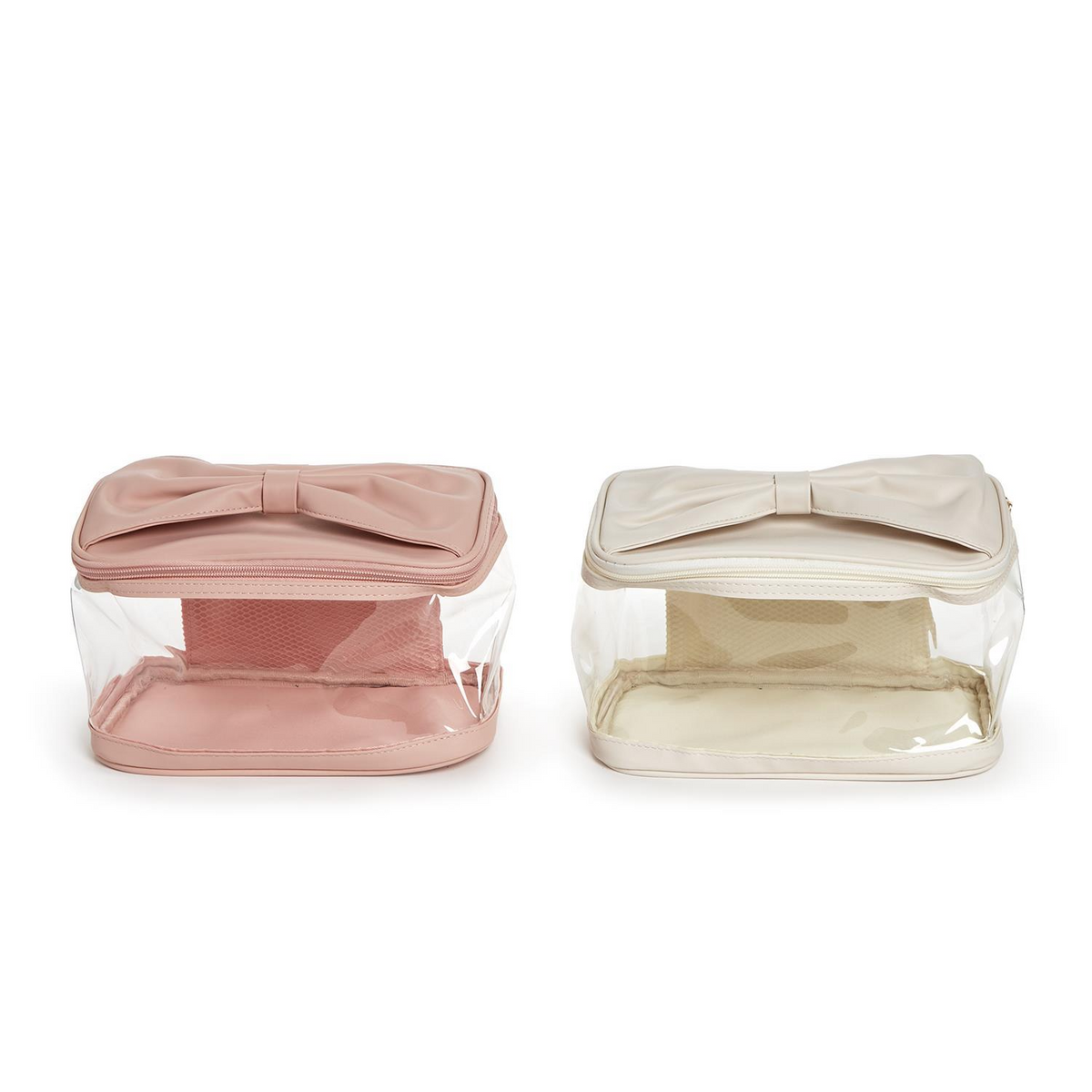 Two see-through cosmetic cases with bow accents on top, shown in pink and cream colors.