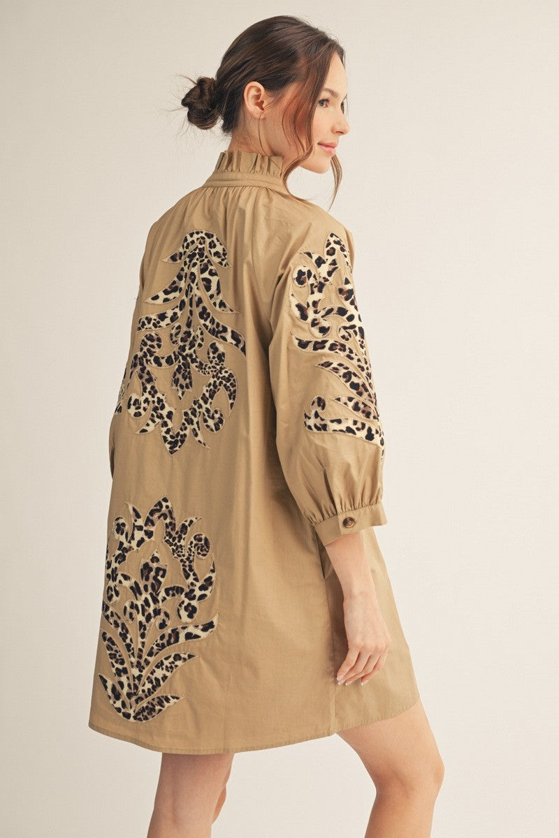Tan mini dress with leopard print baroque appliqué on the back and sleeves.