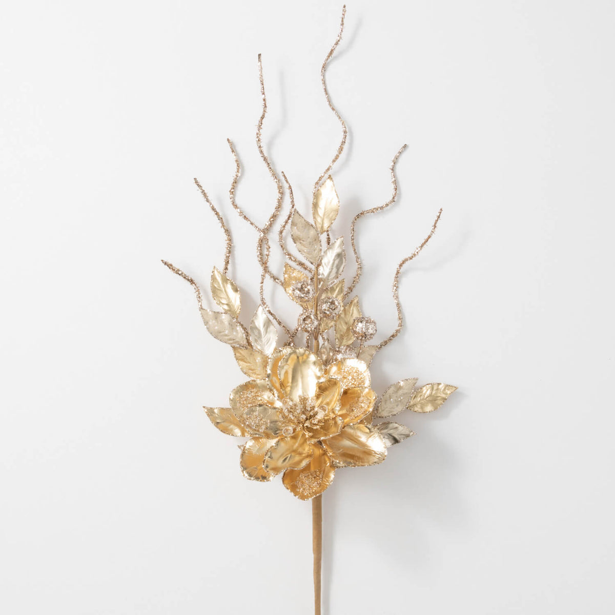 Gold Magnolia Berry Spray with glittered petals, leaves, and decorative curly branches.