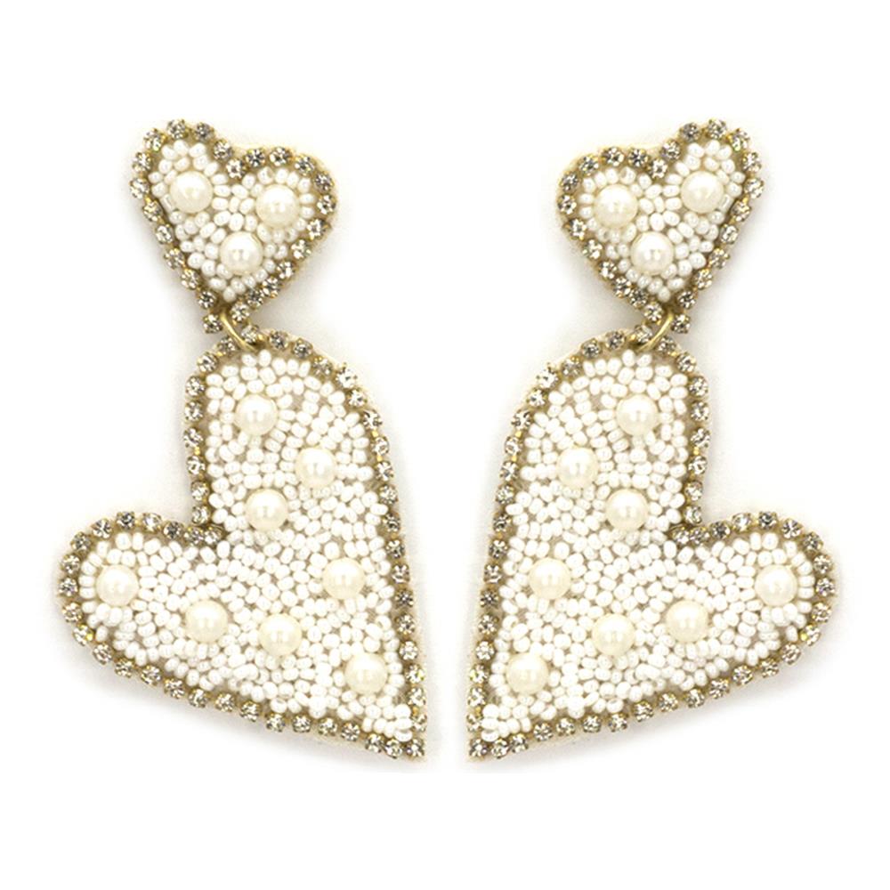 White seed bead heart dangle earring with a delicate beaded pattern.