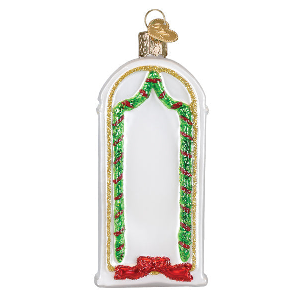 New Home ornament featuring a cozy room interior with warm lighting inside a clear glass sphere.