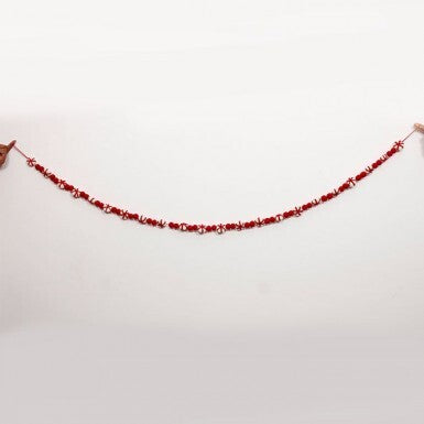 60-inch felt garland featuring red pom-poms and white candy cane-striped balls on a red string.