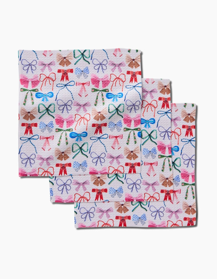 Set of three waffle weave dishcloths in recycled polyester with single-sided prints and hang loops.