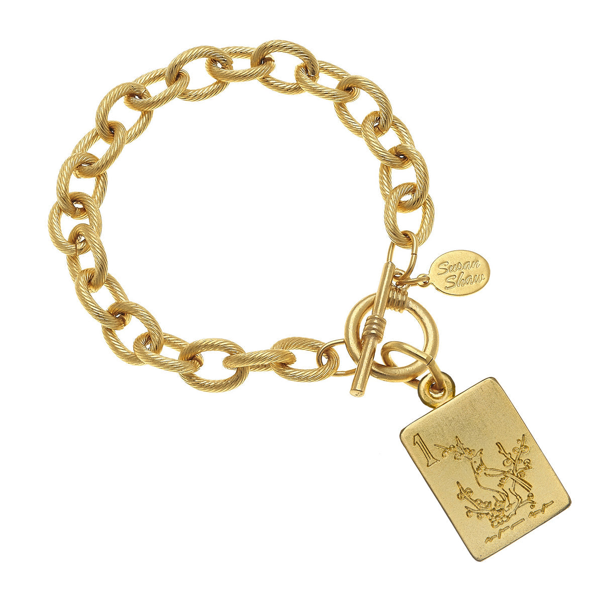 Gold chain bracelet with a toggle clasp and a rectangular One Bam mahjong tile pendant.
