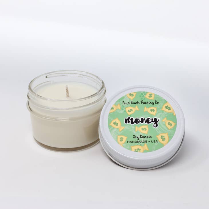 Pop Scents soy candle in a cylindrical glass jar with a white label.