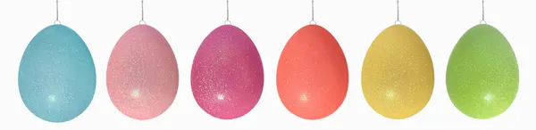 Iridescent glitter Easter egg ornament with a shimmering finish.