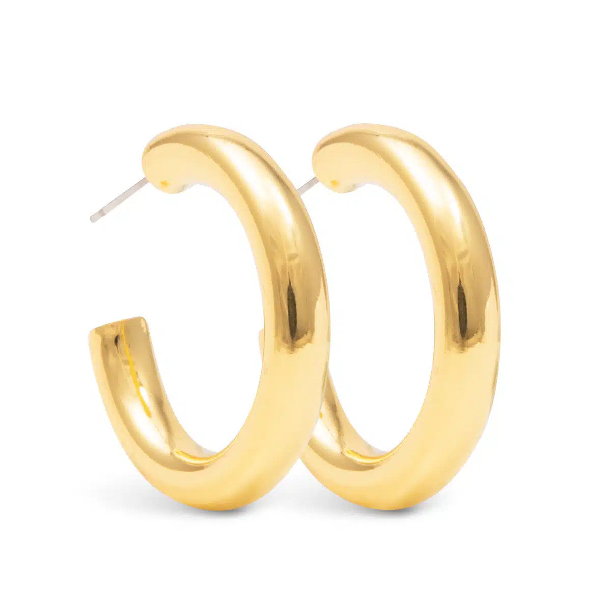 Savannah Polished Hoop Gold Earrings, a pair of thick, shiny gold-tone open hoop earrings.