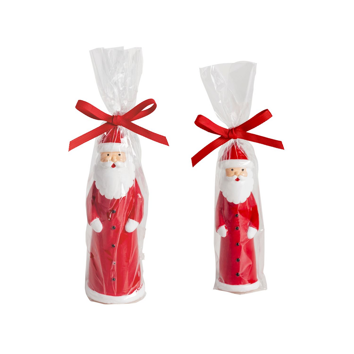Two red and white lacquered wax Santa candles in clear cellophane bags with red bows.