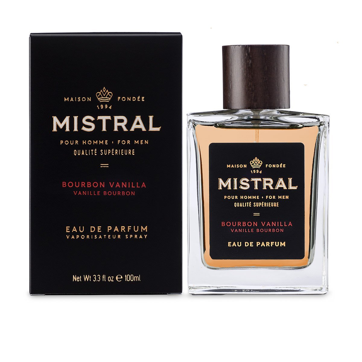 Bottle of Bourbon Vanilla Eau de Parfum with a clear glass body, amber liquid inside, and a dark cap.