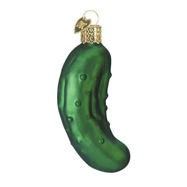 Green glass pickle Christmas ornament with a gold cap and heart-shaped charm.