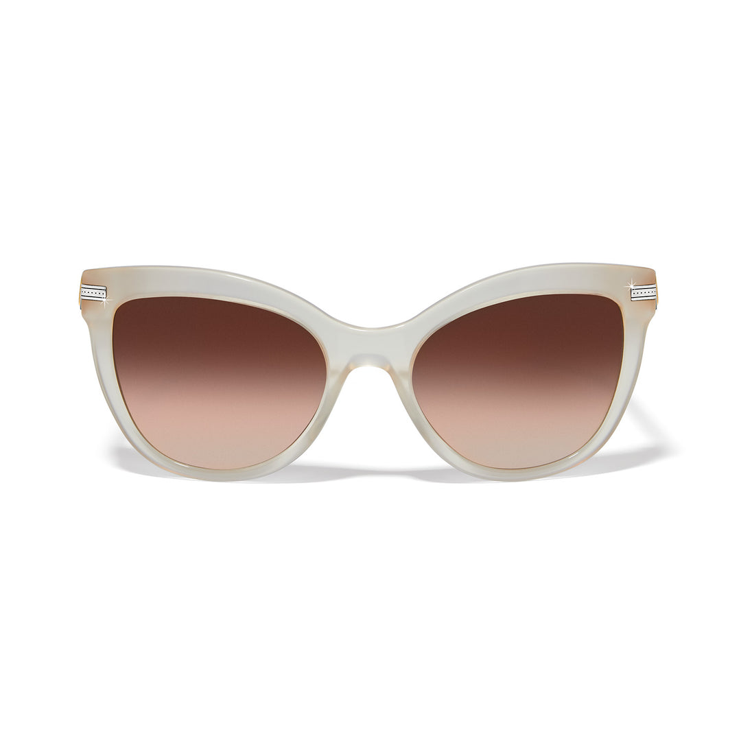 Cream cat eye sunglasses with two-tone accents offering UVA/UVB protection.
