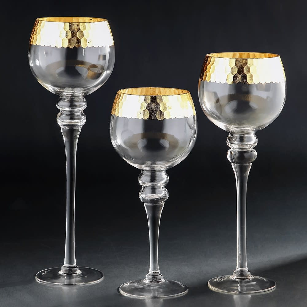Tall hurricane wine glass with clear body, gold honeycomb-patterned rim, and sleek stem.