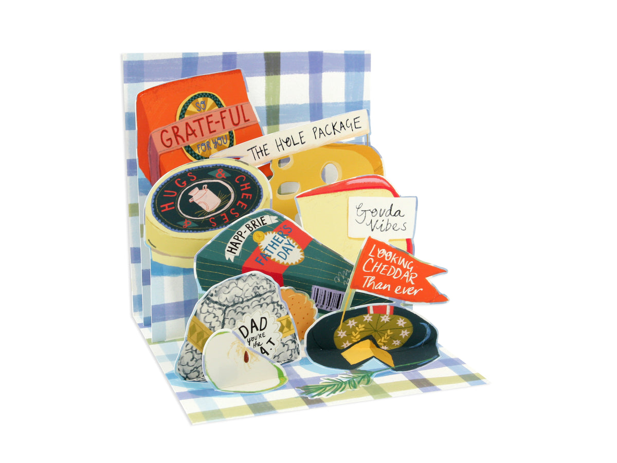 Pop-up Father's Day card featuring various cheeses with puns like 'Grate-ful' and 'Gouda Vibes'.