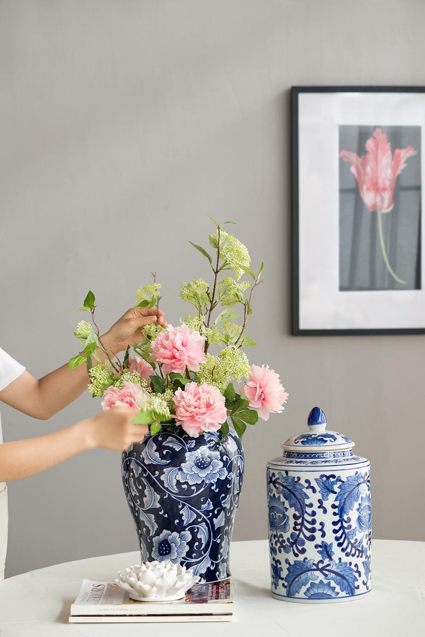 Aline Ginger Jar, Medium, featuring a blue and white floral porcelain design on a table.