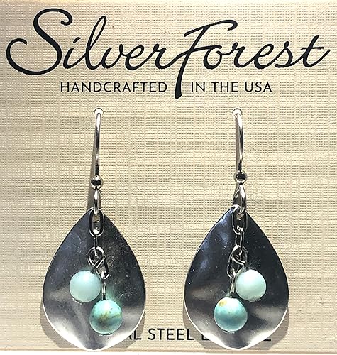 Hammered silver teardrop earrings with two turquoise beads on surgical steel fish hook earwires.