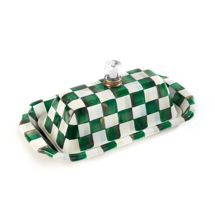 Emerald green and white checkered butter dish with a glass and brass knob on the lid.
