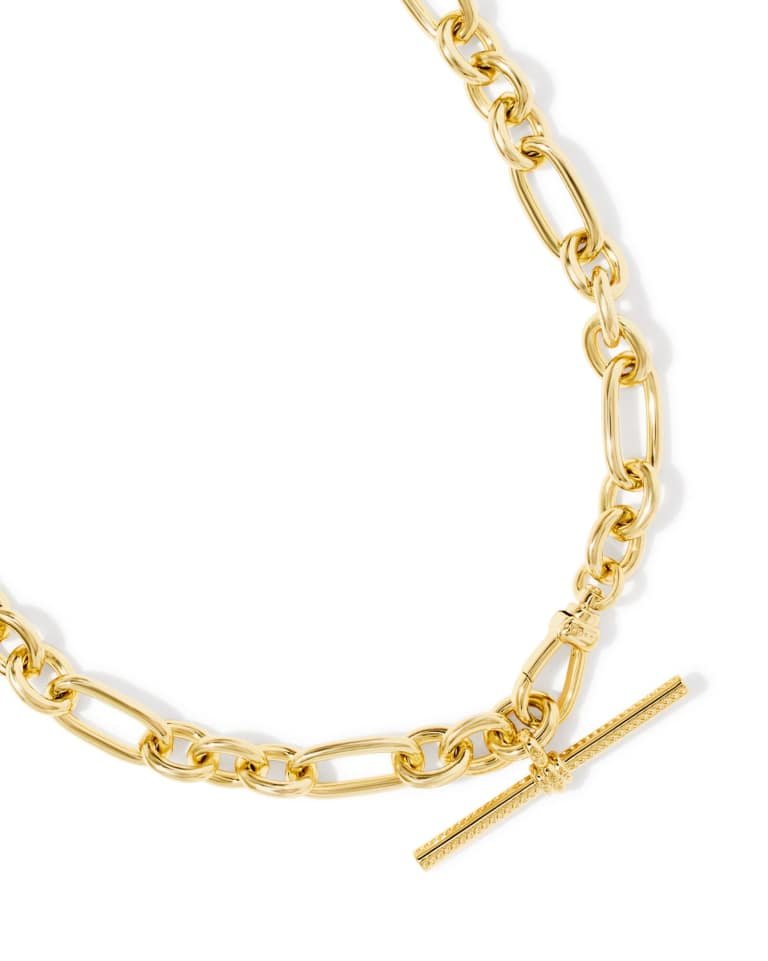 Embry gold link and chain necklace with a textured T-bar closure and mixed-link design.