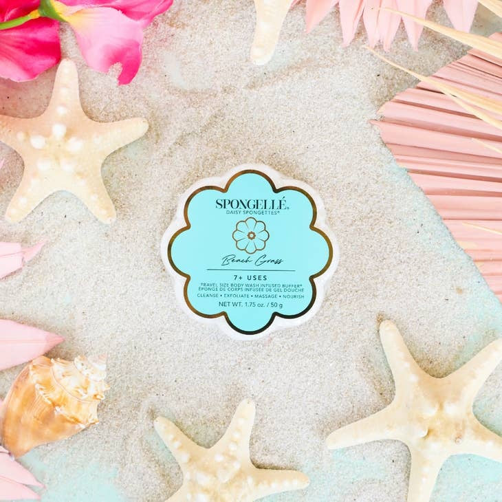 Daisy Collection Spongette body wash infused sponge in soft beige with white floral pattern.
