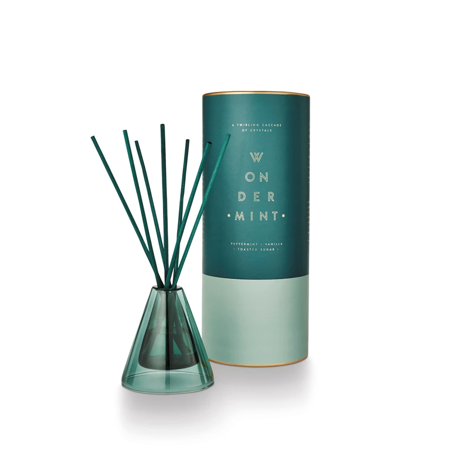Wondermint Winsome diffuser in a white ceramic vessel with a minimalist silhouette.