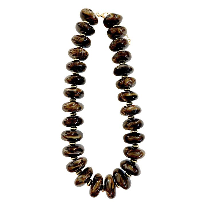 Randi Chunky Beaded Necklace featuring large, glossy brown marbled beads and gold-tone spacers.
