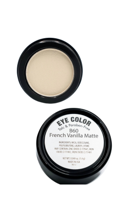 French Vanilla Matte eye shadow in a black circular pot with its lid showing product details.