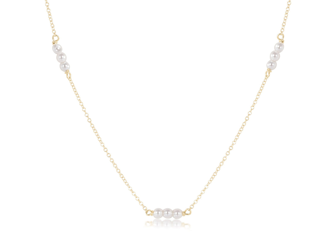 Gold-filled choker necklace featuring a 3mm pearl pendant.