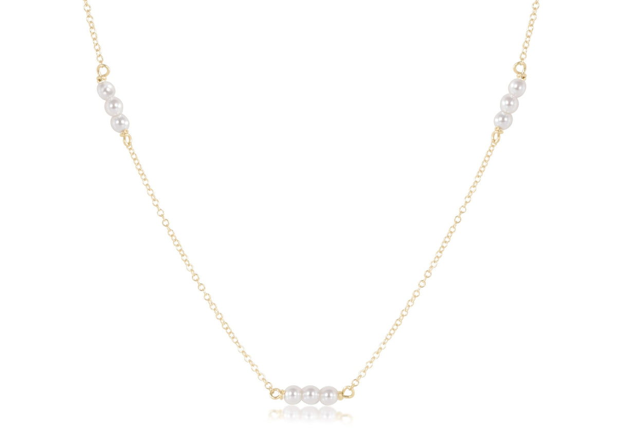Gold-filled choker necklace featuring a 3mm pearl pendant.