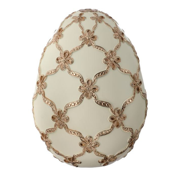 9-inch gilded resin egg with a lattice cutout pattern