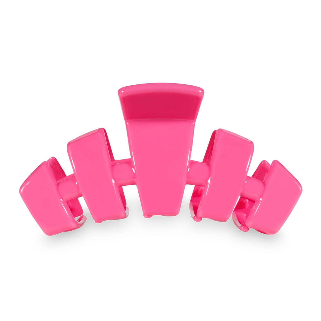 Large classic hair clip with bendable teeth in a neutral tone.