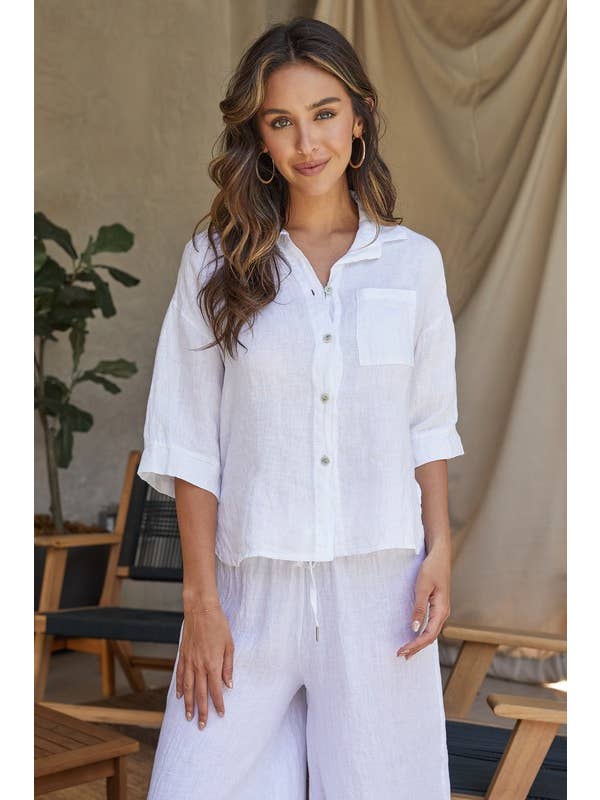 Amalia Linen button-down shirt in natural color with three-quarter sleeves.