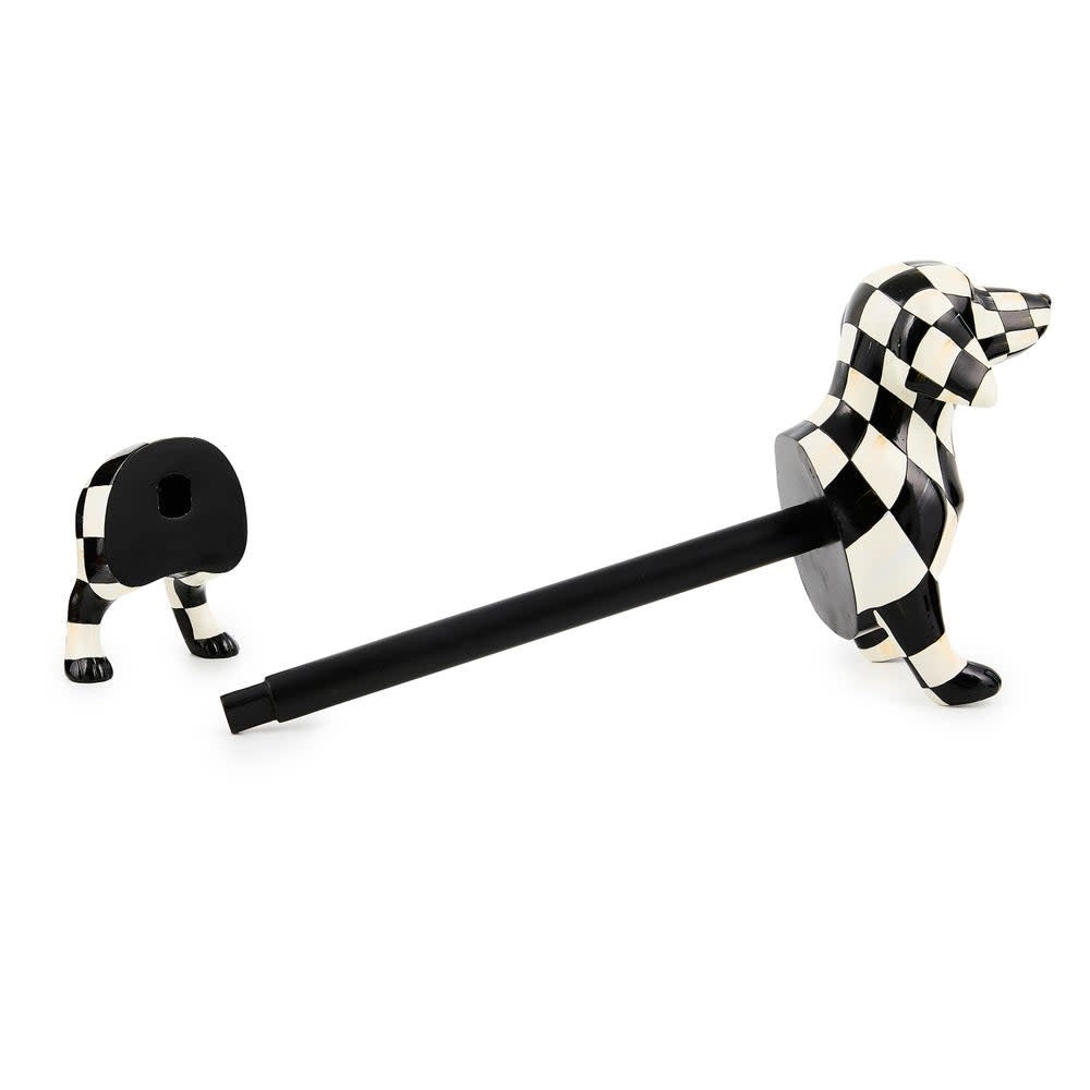 Resin and wood dachshund paper towel holder with natural finish.