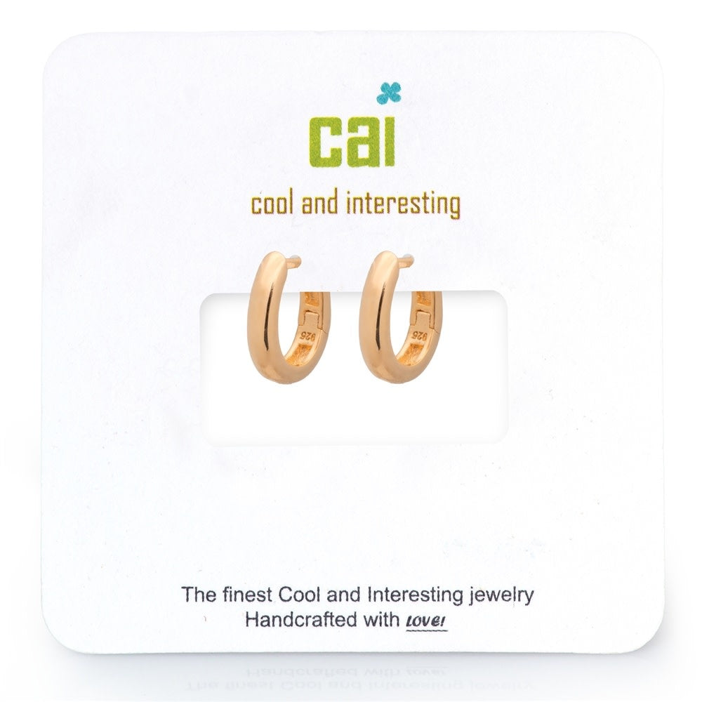 Gold smooth oval huggie hoop earring with a plain dainty silhouette.