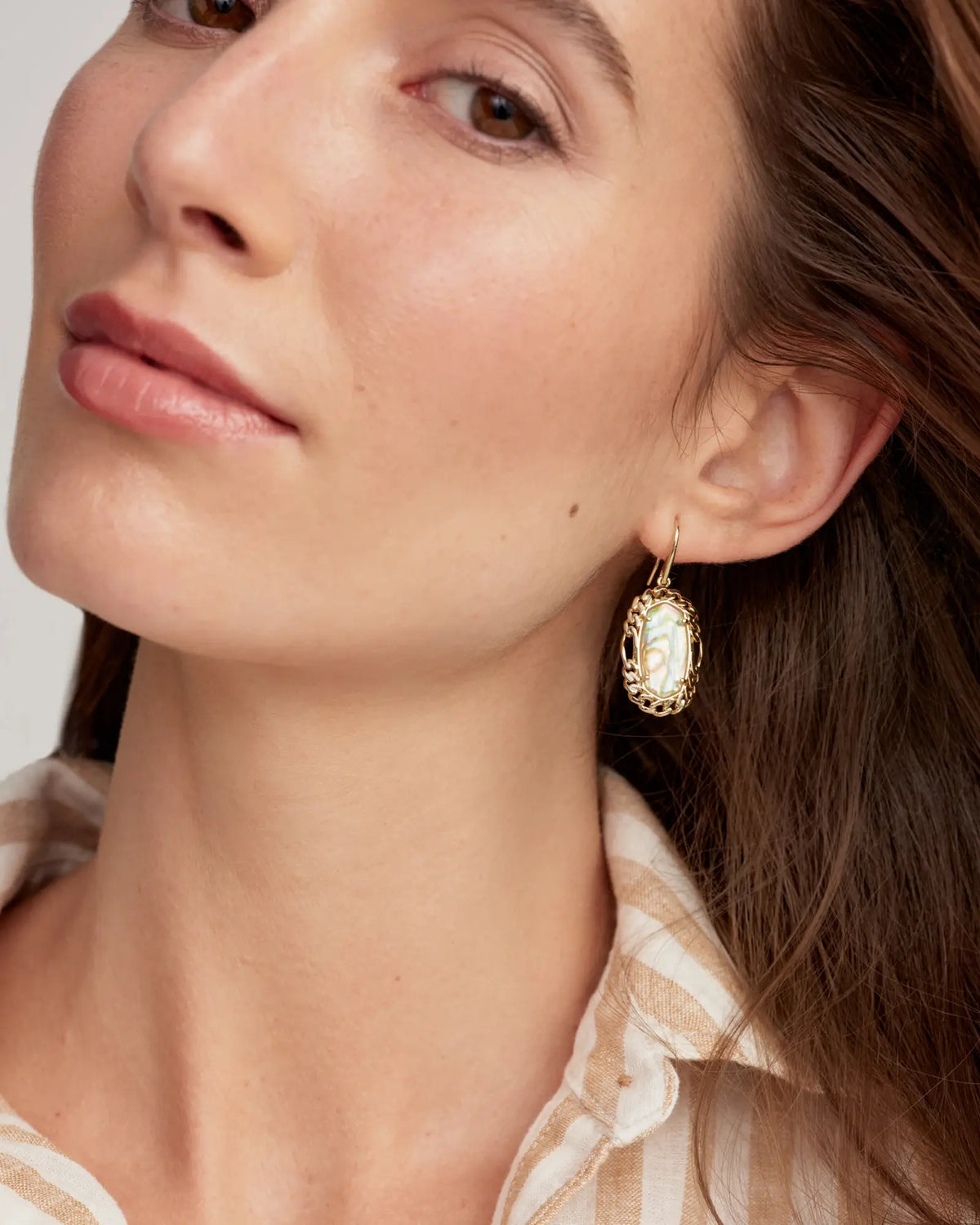 Dani Figaro Frame Drop Earrings with shimmering stone centers in an edgy frame silhouette.